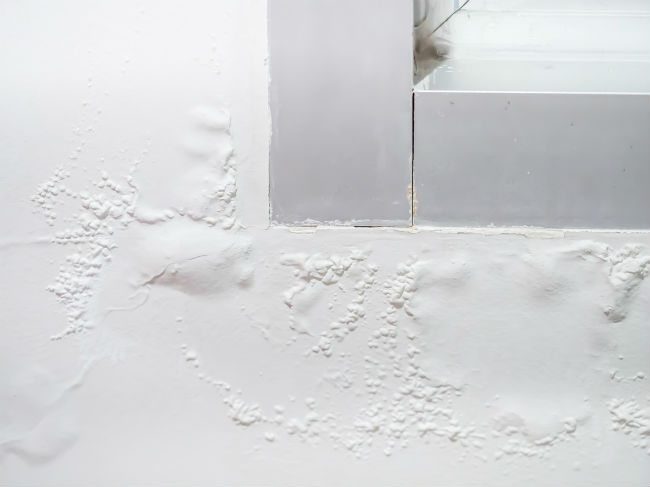 Blistering render on an exterior wall