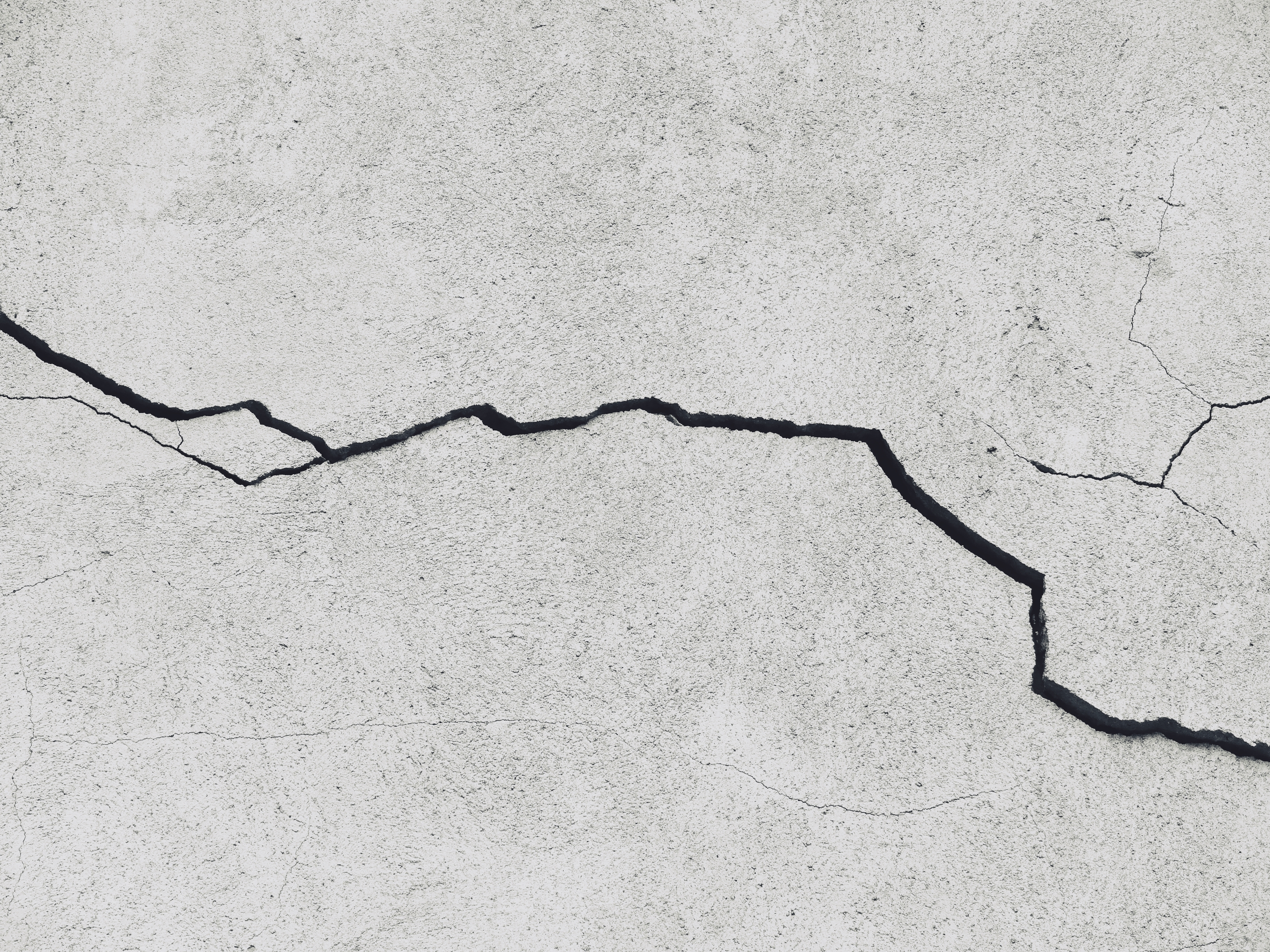 Cracked render on an exterior wall